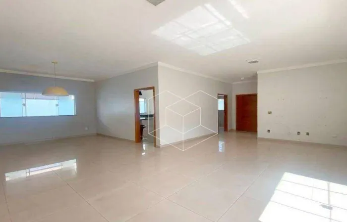 Casa com 3 dormitórios à venda, 200 m² por R$ 1.150.000,00 - Condomínio Flamboyant - Jaú/S