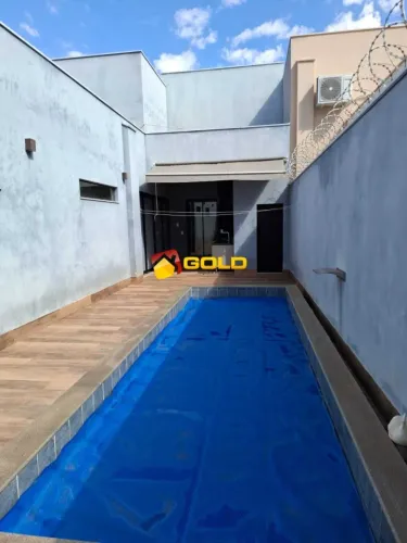 Casa para Venda em Uberlândia, Vigilato Pereira, 3 dormitórios, 3 suítes, 4 banheiros, 2 v