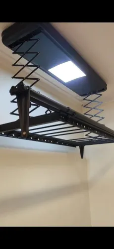 Estalaçao se estededor de roupa automatico em apartamentos