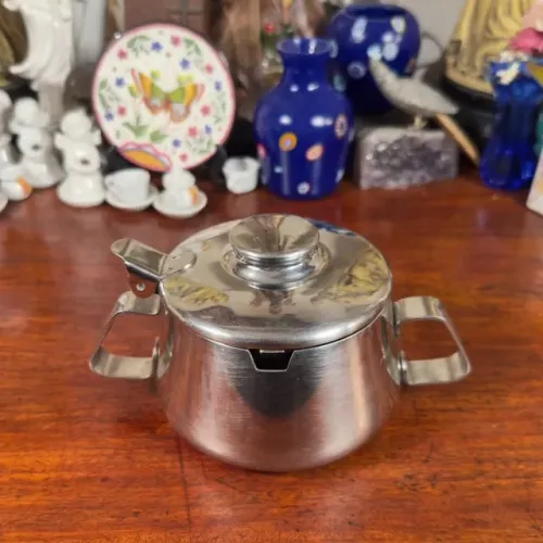 Antigo açucareiro em inox Hércules.