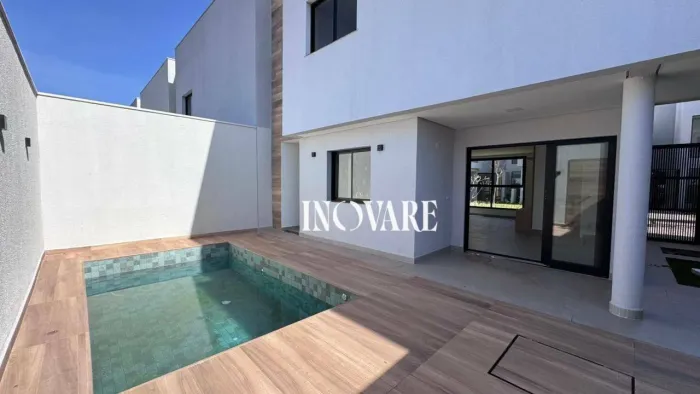Casa com 3 dormitórios para alugar, 134 m² por R$ 10.000,00/mês - Karaiba - Uberlândia/MG