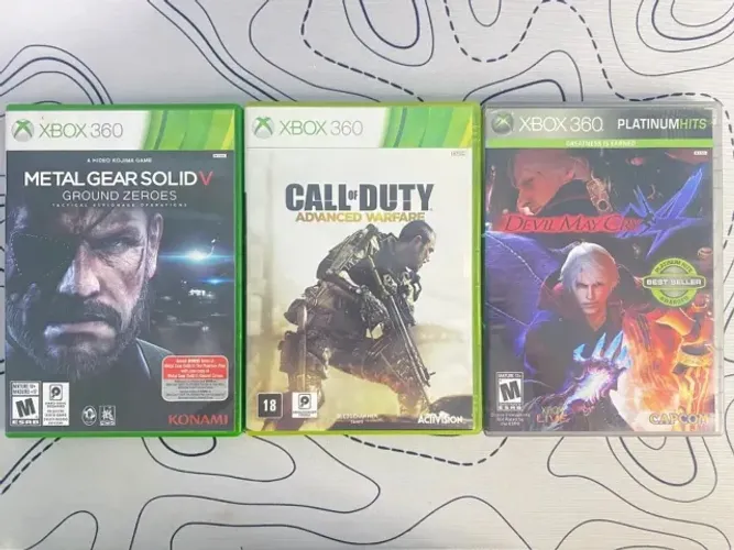 Metal Gear Solid 5, Call of Duty: advanced warfare, e Devil May Cry 4 todos para XBOX 360