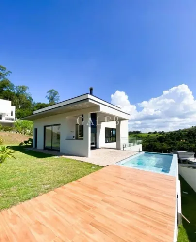 Casa de luxo em condomínio: 3 suítes, 2 salas, 4 vagas de garagem, 600m² em Atibaia-SP no 