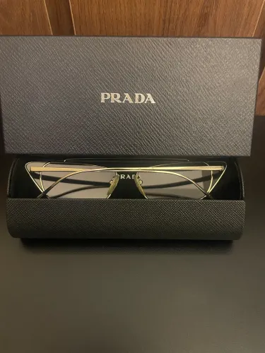 Óculos Prada metálico