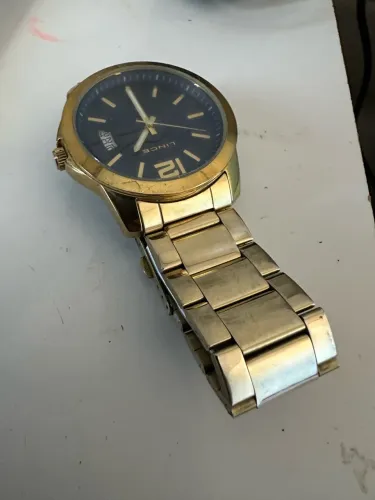 Relógio Line Dourado Novíssimo