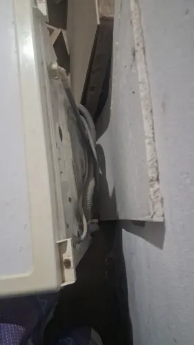 Máquina de lavare secar com rolamento travado