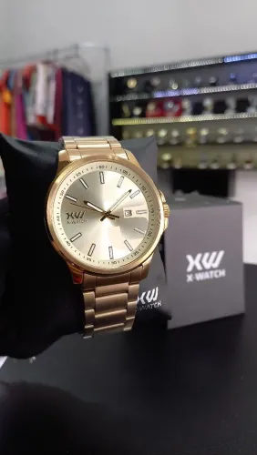 Relógio x-watch dourado original 