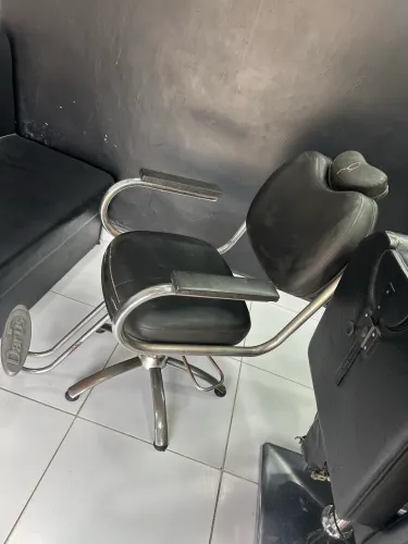 Cadeira de barbeiro ou cabeleireira