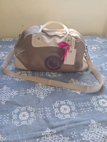 Bolsa de viagem com tag da uncle k