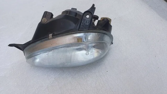 Corsa farol esquerdo novo original arteb