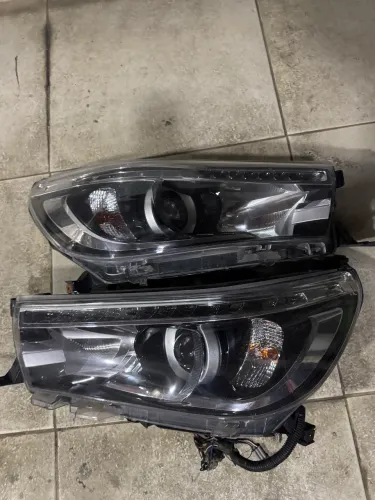 Farol Hilux srx