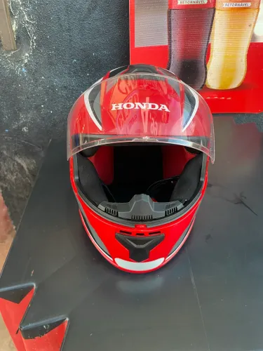 capacete honda 300$ ou troco em um com óculos, pago volta $$$