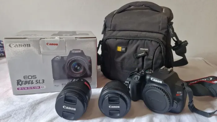 Canon SL3 + Lente 18-55 + Lente 50mm + Case + Tripé