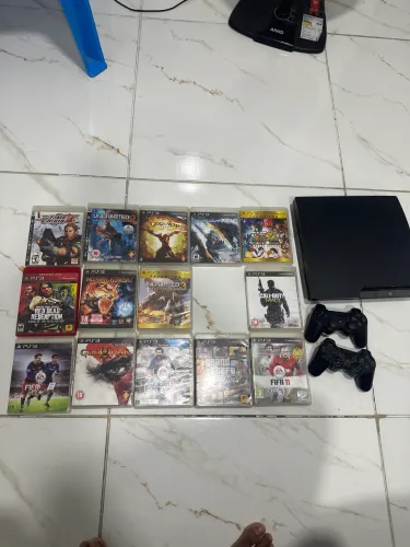 Vendo Ps3 Slim + 14 jogos + 2 controles