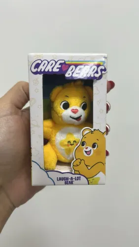 Mini pelucia ursinho carinhoso amarelo. Care bear