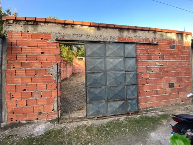 VENDO TERRENO JÁ MURADO COM CONSTRUÇÃO INICIADA