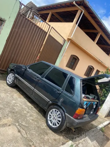 Vendo som  ou troco né motor fit uno 1.0 ano 95