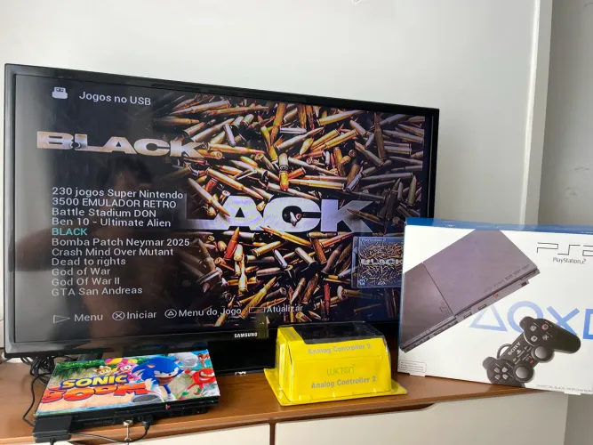 PlayStation 2 + caixa + 28 jogos