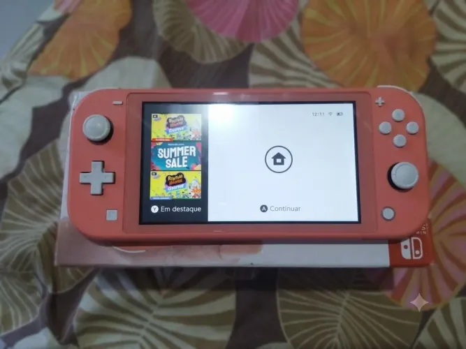 Nintendo Switch Lite Coral + Notal fiscal