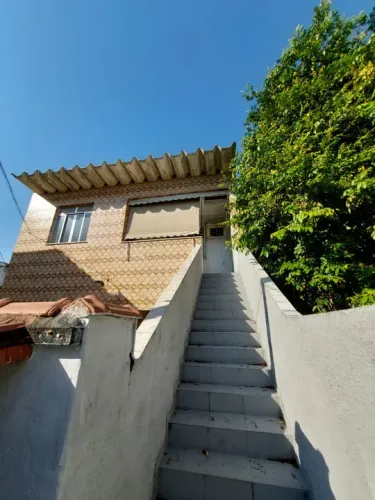Casa sobrado, localizada na Rua Frederic Choppin, Jardim América - RJ