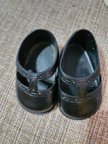 Sapatos de boneca antiga