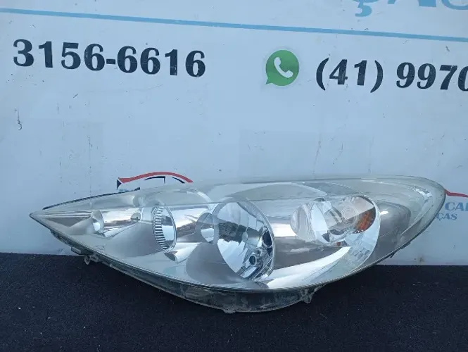 farol esquerdo peugeot 207