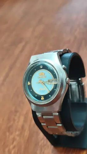 RELÓGIO ORIENT AUTOMÁTICO VINTAGE PRETO COM O CENTRO AZUL CLARO