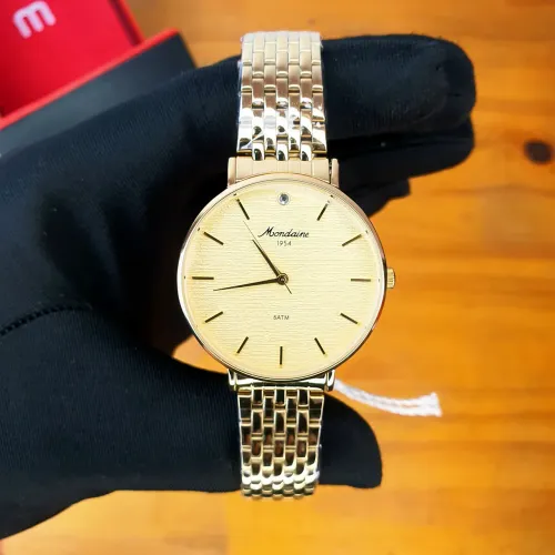 Relógio Mondaine 1954 feminino 36mm Dourado 32923LPMVDE1