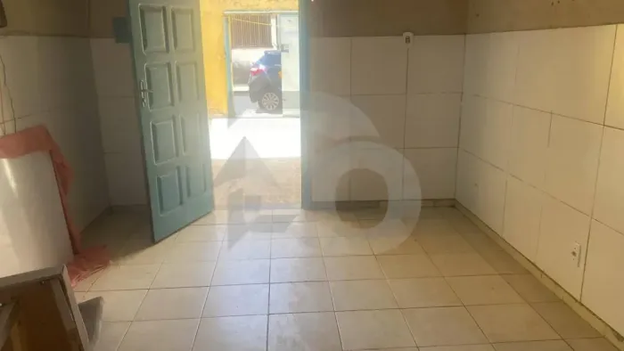 Casa no Bairro Olaria com Suíte, Quintal e 2 Vagas de Garagem