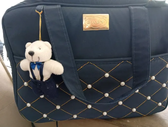 BOLSA TIRA COLO DE BEBÊ 