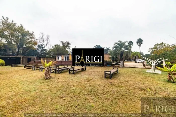 Casa com 3 dormitórios para alugar, 200 m² por R$ 19.300,00/mês - Arquipélago - Porto Aleg
