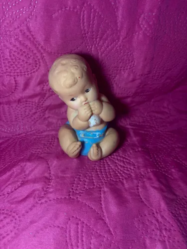 Bebê guloso antigo de vinil