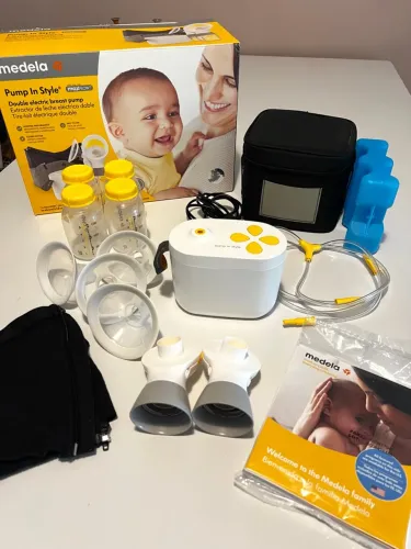 kit medela pump in style max flow dupla + top hands-free + 150 sacos medela