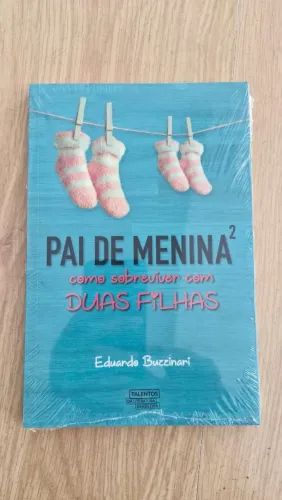 PAI DE MENINA²: COMO SOBREVIVER COM DUAS FILHAS. EDUARDO BUZZINARI. EDITORA NOVO SÉULO.