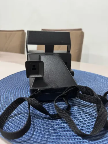 Máquina fotográfica polaroide 