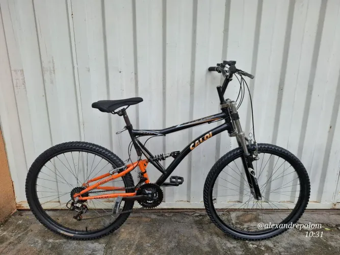 BICICLETA CALOI XRT FULL SUSPENSION ARO 26 / 21 MARCHAS.(POSSO ENTREGAR)