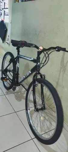 Vendo bicicleta aro 26 completa praticamente nova toda original 