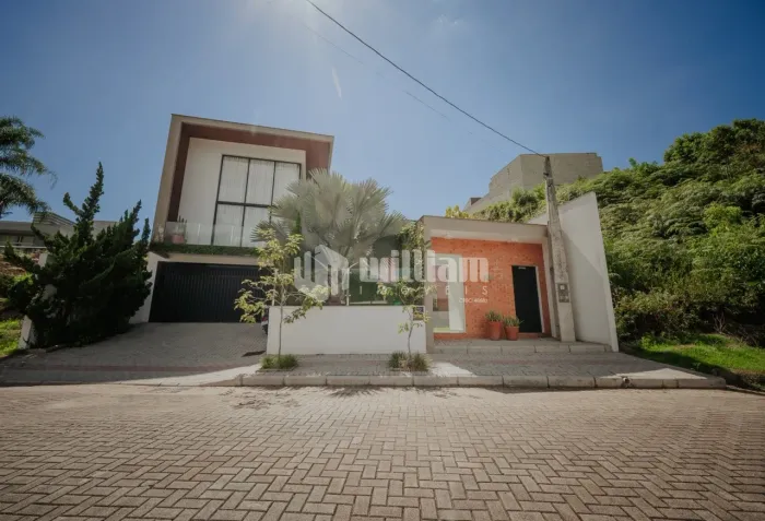 Casa à venda no Souza Cruz, Loteamento Lagoa Dourada - 3 suítes, piscina com borda infinit