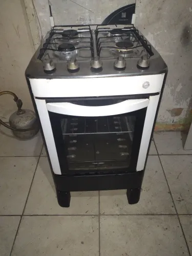 Fogão esmaltec 4 bocas tampo inox semi novo pra hj temos entrega não e elétrico 