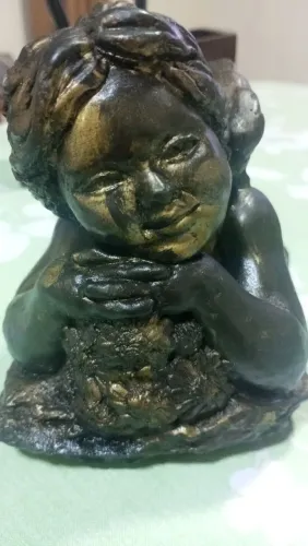 Duas estatuetas de anjo e resina Querubim 26 cm por 02duas peças só vendo cada peça 280 