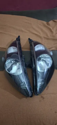 Farol honda fit original com todas as trava intacta