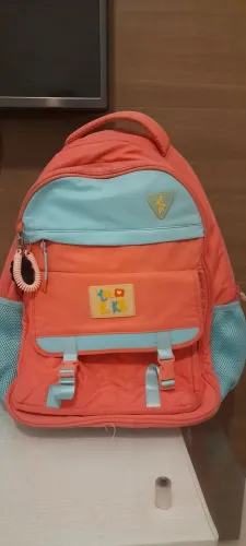 Mochila Luluca rosa e azul em ótimo estado. 