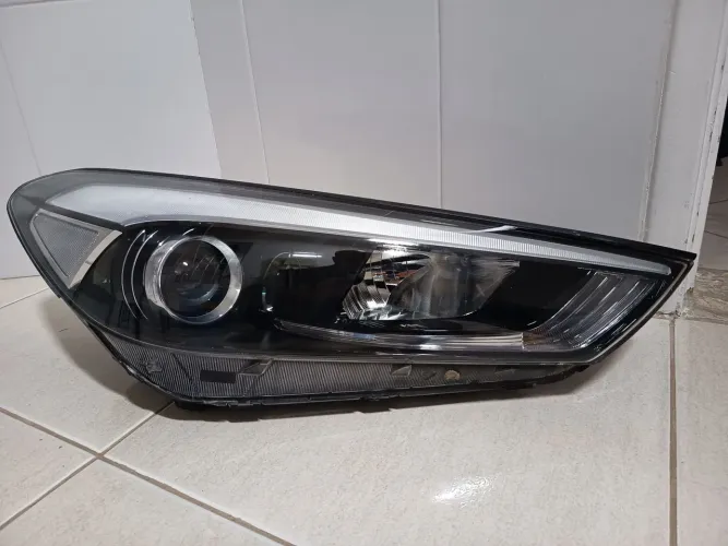 Farol new Tucson lado direito 17/21