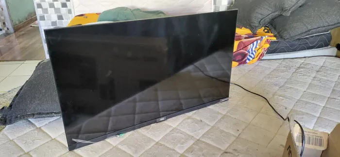 Vendo essa televisão AOC smart tv 32,,na caixa