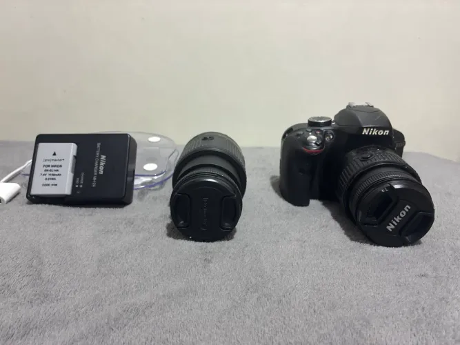 vendo nikon d3300 com 22780 clicks, vem com uma lente 55-200mm
