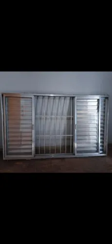 JANELA DE ALUMÍNIO 6 FOLHAS TAM.2X 1.20 COM VIDROS E GRADE, USADO E BOM ESTADO