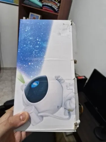 Projetor astronauta, intacto novo so dinheiro a vista ou pix na hora ,não entrego