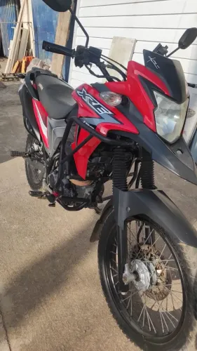 Vendo moto XRE super conservada