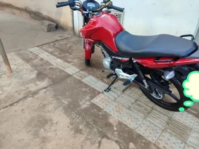 Vendo Moto em perfeito  estado Honda Vermelha 