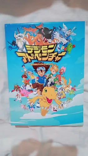 Livro ilustrado com 54 episódio de Digimon + extras (fan made)
